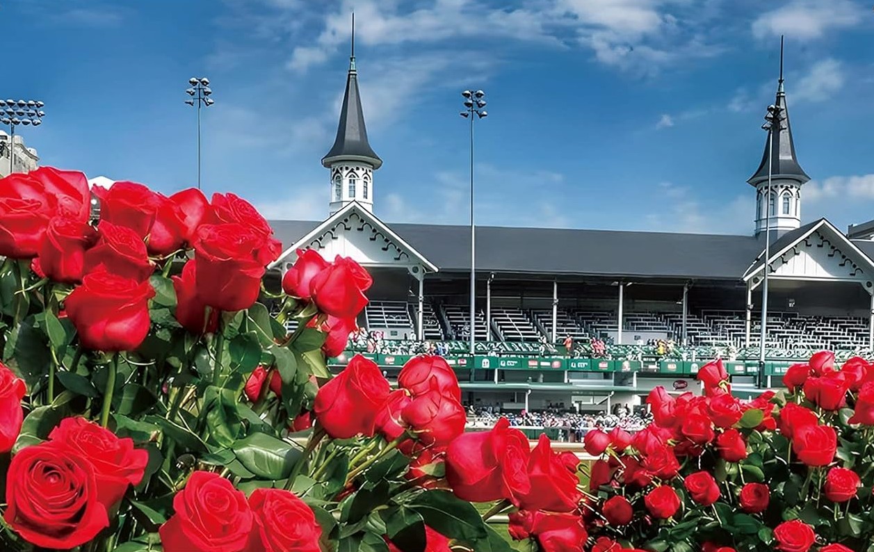 Churchill Downs twin spires framed by red roses